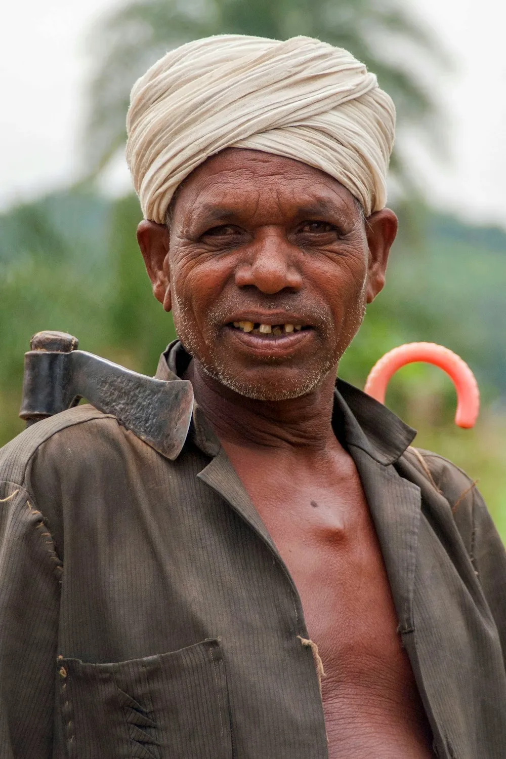Smiling farmer in his field